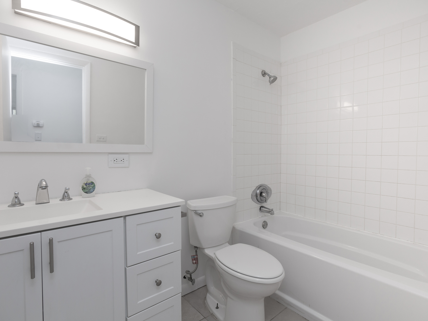 701 Spring Court, Unit 5 University Park, IL 60484 - Photo 14 of 17 a bathroom with a sink a toilet and a bathtub