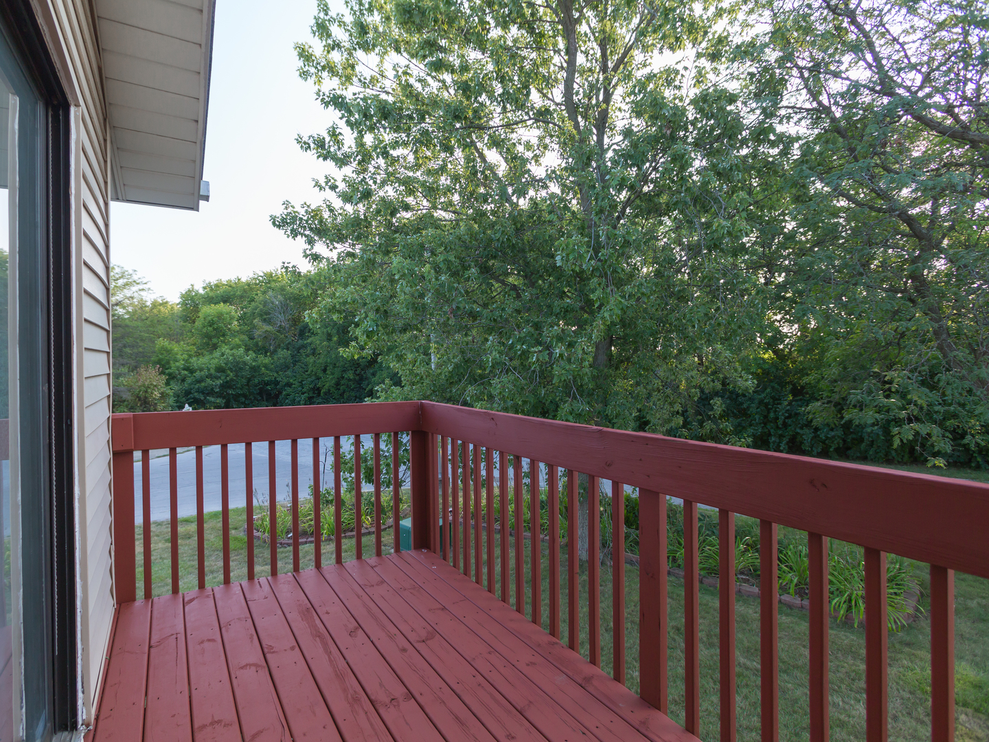 701 Spring Court, Unit 5 University Park, IL 60484 - Photo 17 of 17 a view of balcony with wooden floor