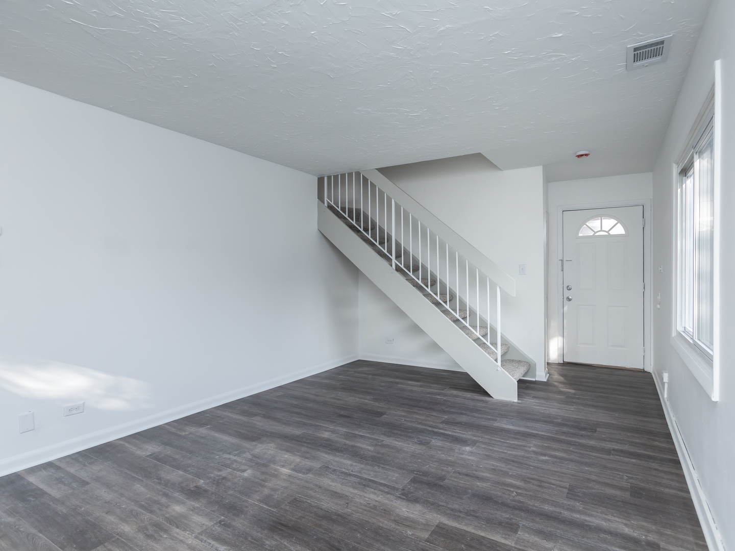 701 Spring Court, Unit 5 University Park, IL 60484 - Photo 3 of 17 a view of entryway with wooden floor