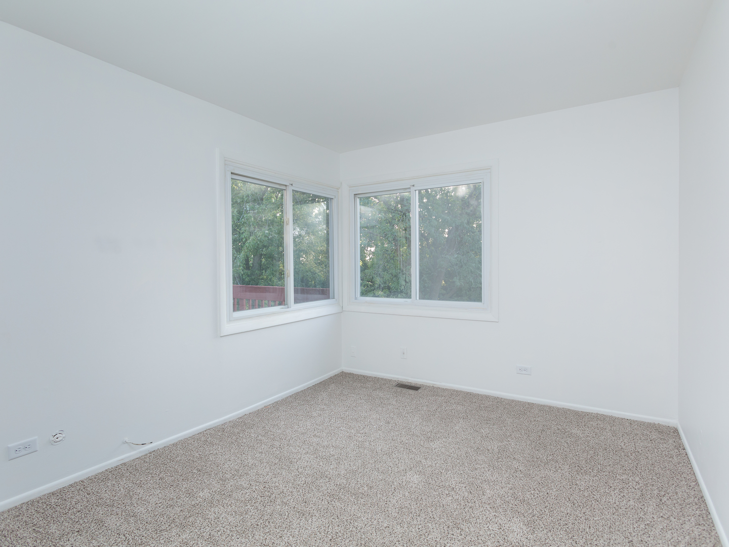 701 Spring Court, Unit 5 University Park, IL 60484 - Photo 10 of 17 an empty room with windows