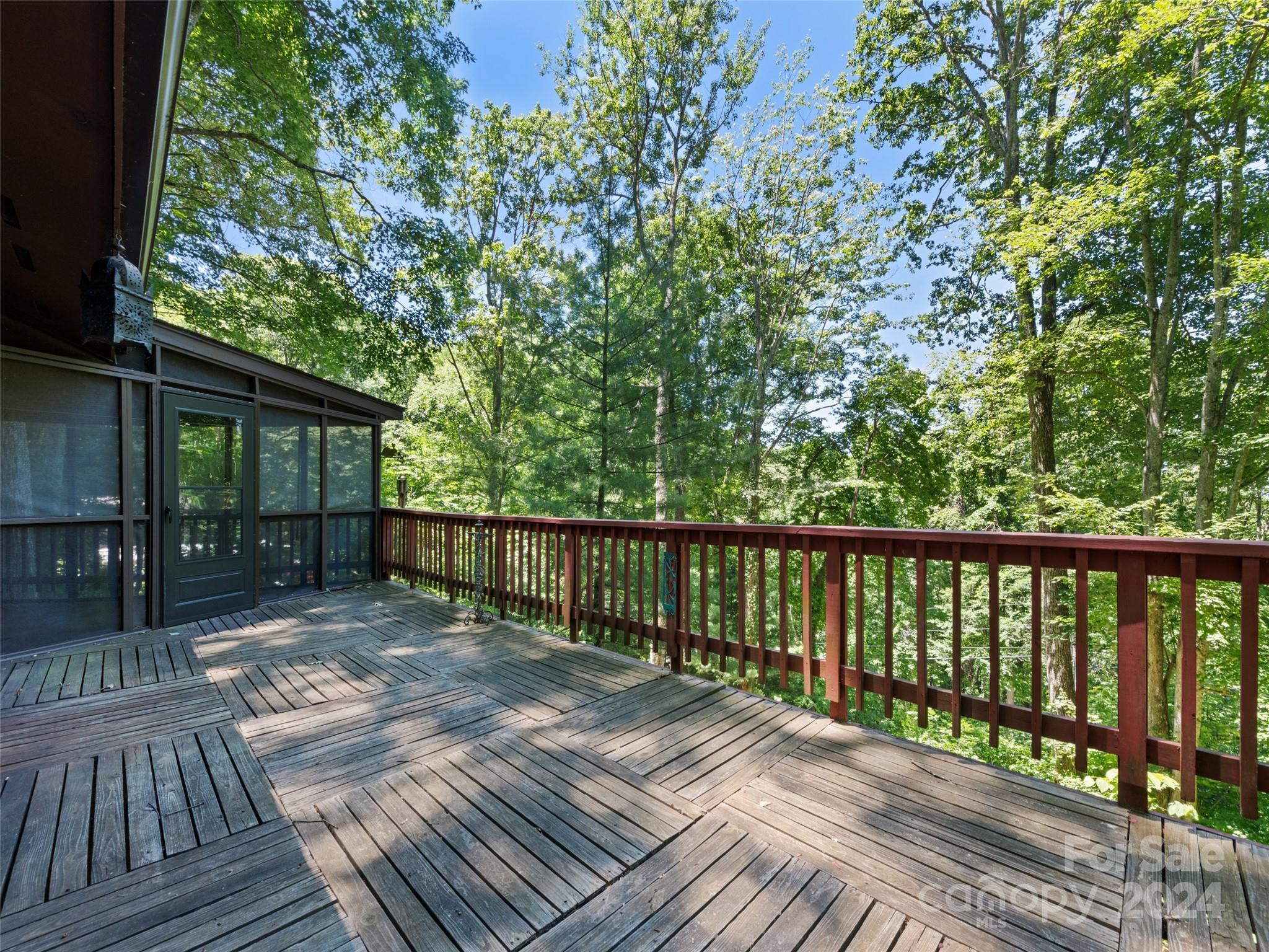 1004 Old Country Road Waynesville, NC 28786 - Photo 11 of 30 a view of balcony with wooden floor