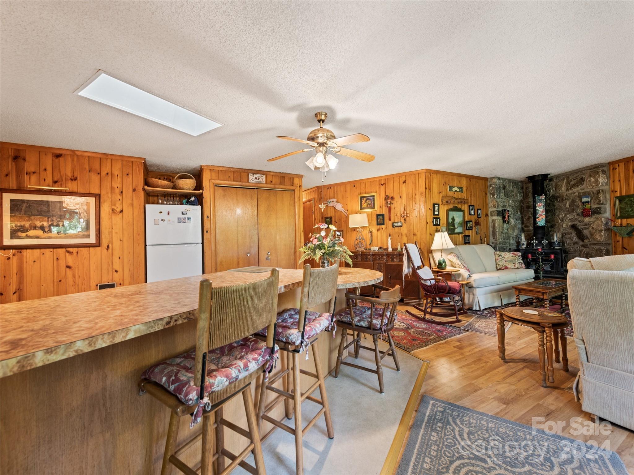 1004 Old Country Road Waynesville, NC 28786 - Photo 13 of 30 a living room with furniture and a large window