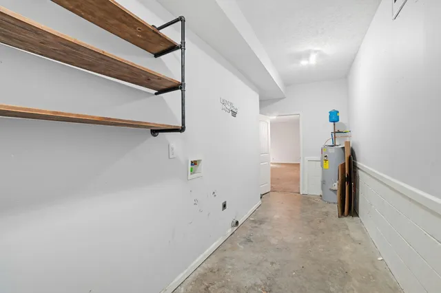 a view of a hallway with storage