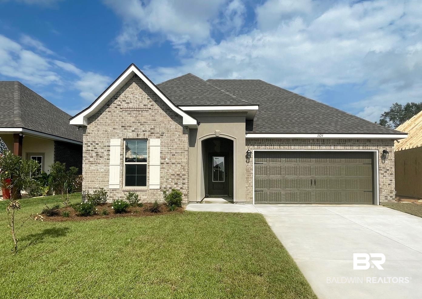 1424 Fenton Circle Foley, AL 36535 - Photo 1 of 20 View of front of house with a front lawn and a garage