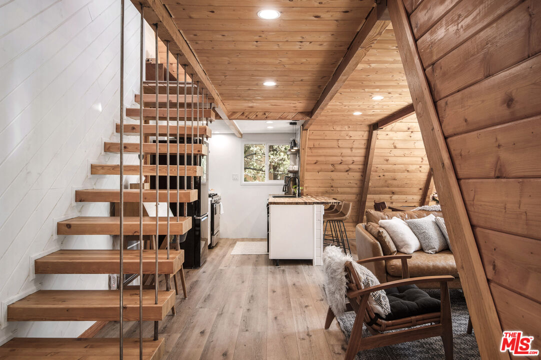 Undisclosed Address Big Bear City, CA 92314 - Photo 16 of 46 a view of entryway and hall with wooden floor