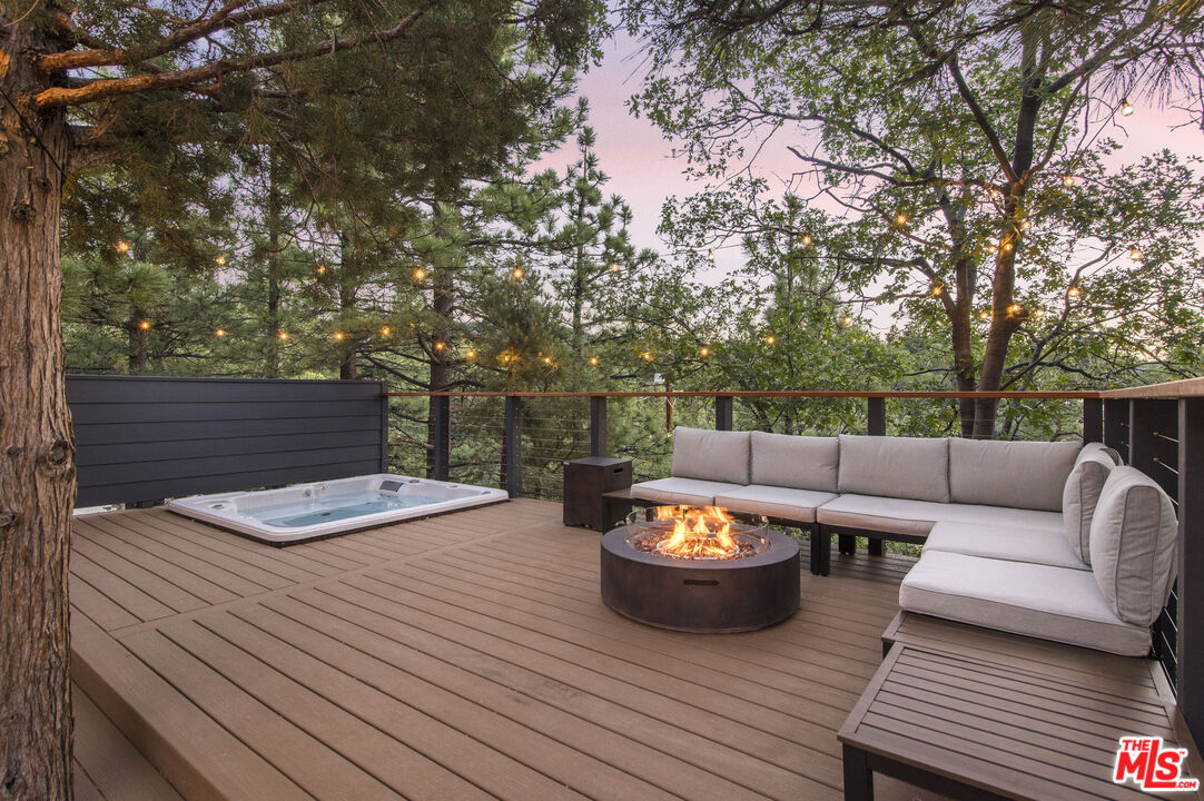 Undisclosed Address Big Bear City, CA 92314 - Photo 34 of 46 a view of a deck with furniture and a backyard