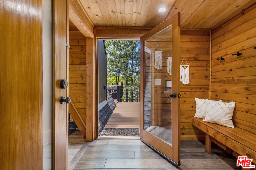 Undisclosed Address Big Bear City, CA 92314 - Photo 6 of 46 a view of a balcony with furniture and the door