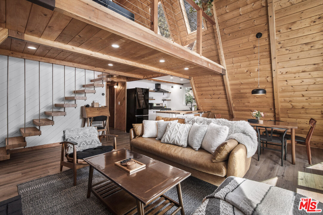 Undisclosed Address Big Bear City, CA 92314 - Photo 10 of 46 a living room with furniture and wooden floor