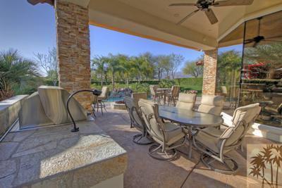 300 Loch Lomond Road Rancho Mirage, CA 92270 - Photo 22 of 25 a view of a patio with a table chairs and a patio
