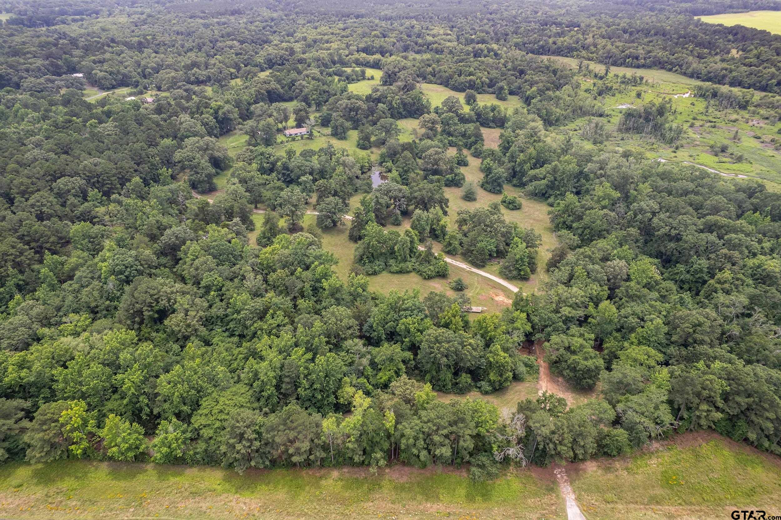 271 Tyler Tx 75708 Tyler, TX 75708 - Photo 21 of 44 an aerial view of residential houses with outdoor space and swimming pool