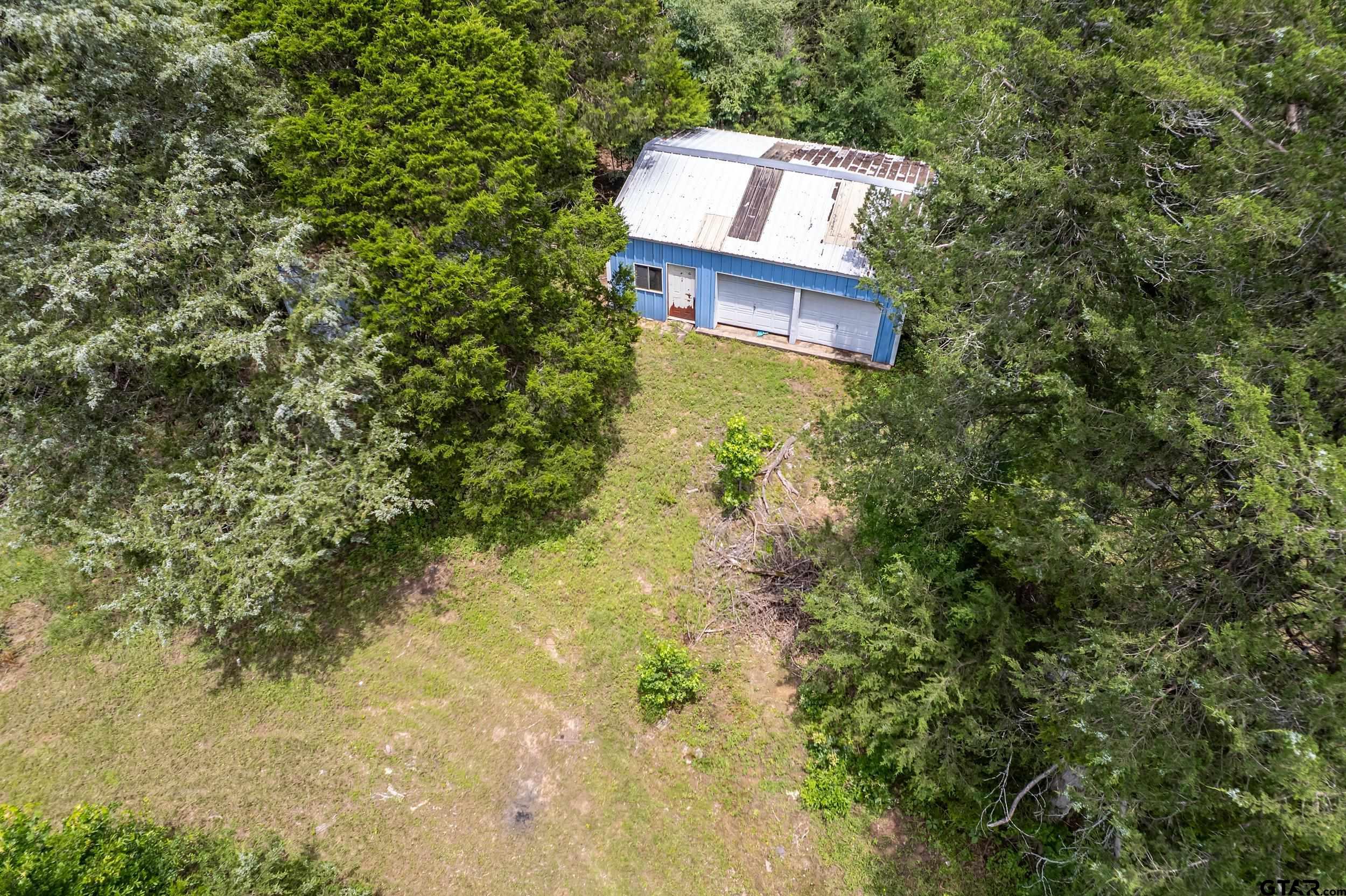 271 Tyler Tx 75708 Tyler, TX 75708 - Photo 31 of 44 a picture of a wall with a lake view