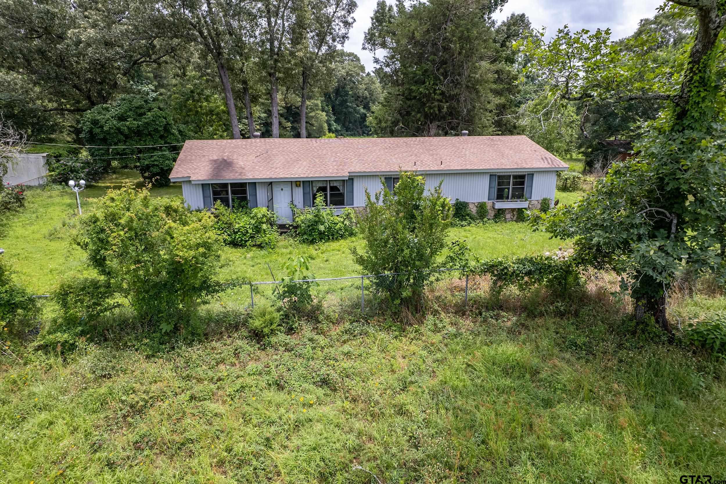 271 Tyler Tx 75708 Tyler, TX 75708 - Photo 38 of 44 a view of a house with garden