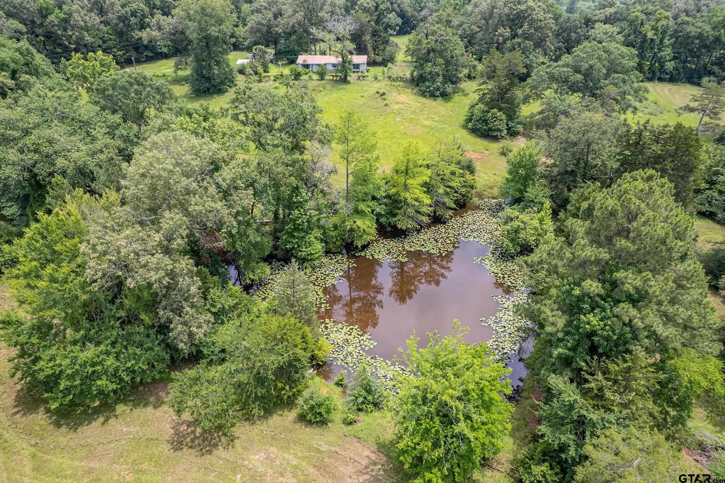 271 Tyler Tx 75708 Tyler, TX 75708 - Photo 41 of 44 a view of a lake view with houses in back