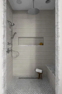 a bathroom with a sink a vanity and a window