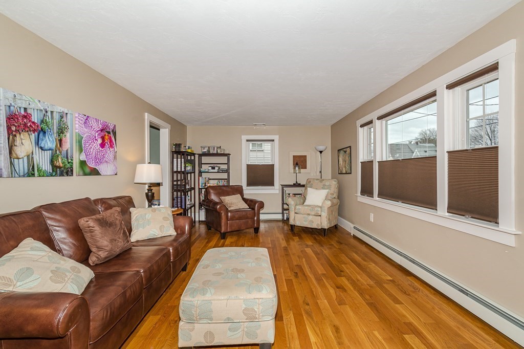 39 Chittick Road Boston, MA 02136 - Photo 12 of 24 a living room with furniture and a flat screen tv