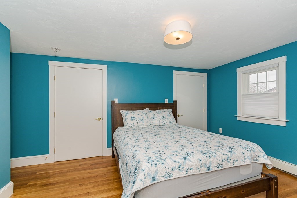 39 Chittick Road Boston, MA 02136 - Photo 15 of 24 a bedroom with a bed and a window