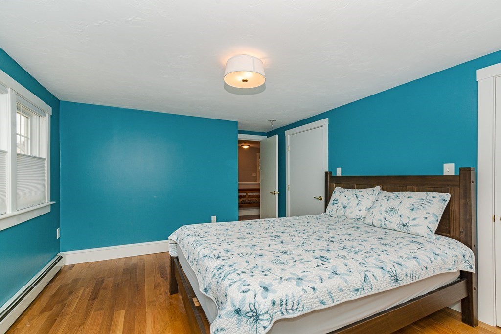 39 Chittick Road Boston, MA 02136 - Photo 16 of 24 a bedroom with a bed and a window