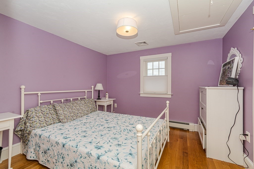 39 Chittick Road Boston, MA 02136 - Photo 20 of 24 a bedroom with a bed and a couch