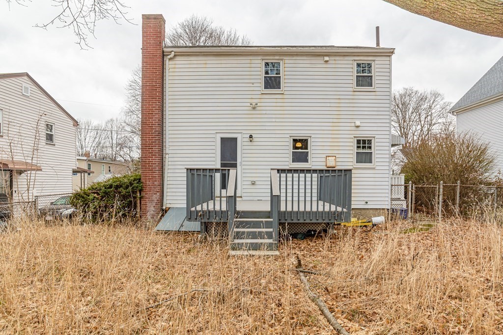39 Chittick Road Boston, MA 02136 - Photo 4 of 24 a view of a house with a yard and sitting area