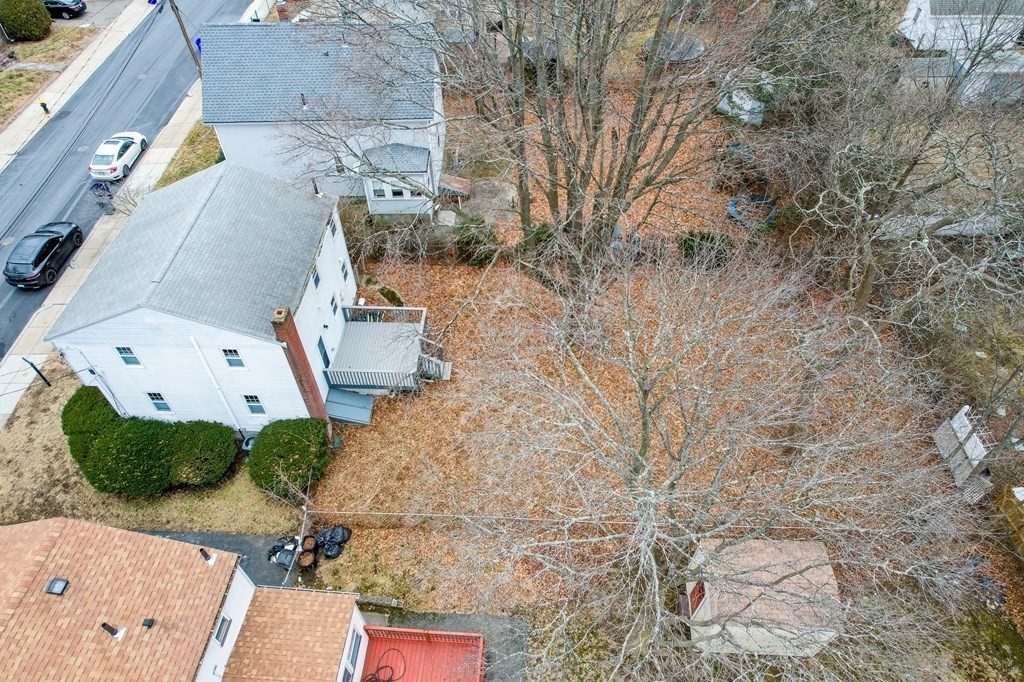 39 Chittick Road Boston, MA 02136 - Photo 5 of 24 an aerial view of a house with a yard