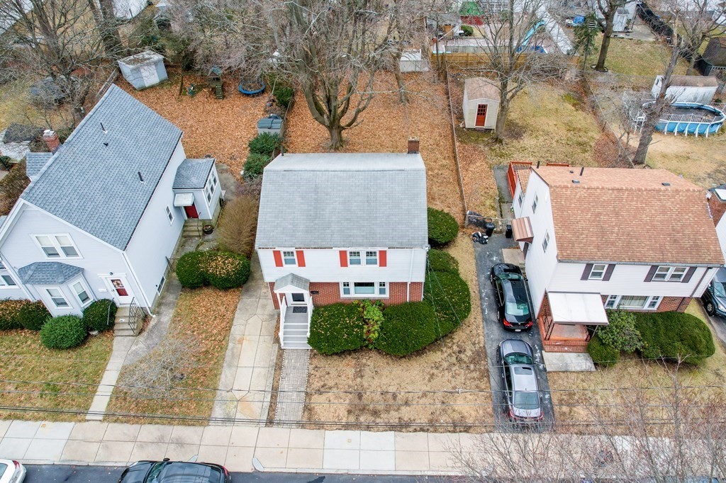 39 Chittick Road Boston, MA 02136 - Photo 6 of 24 an aerial view of a house with a yard and large tree