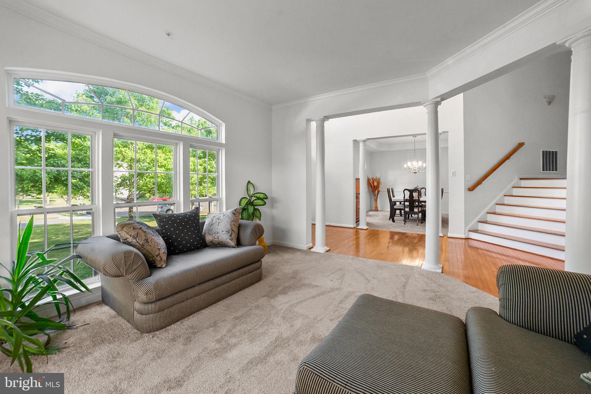 14909 Taryn Lea Court Accokeek, MD 20607 - Photo 11 of 49 a living room with furniture and a large window