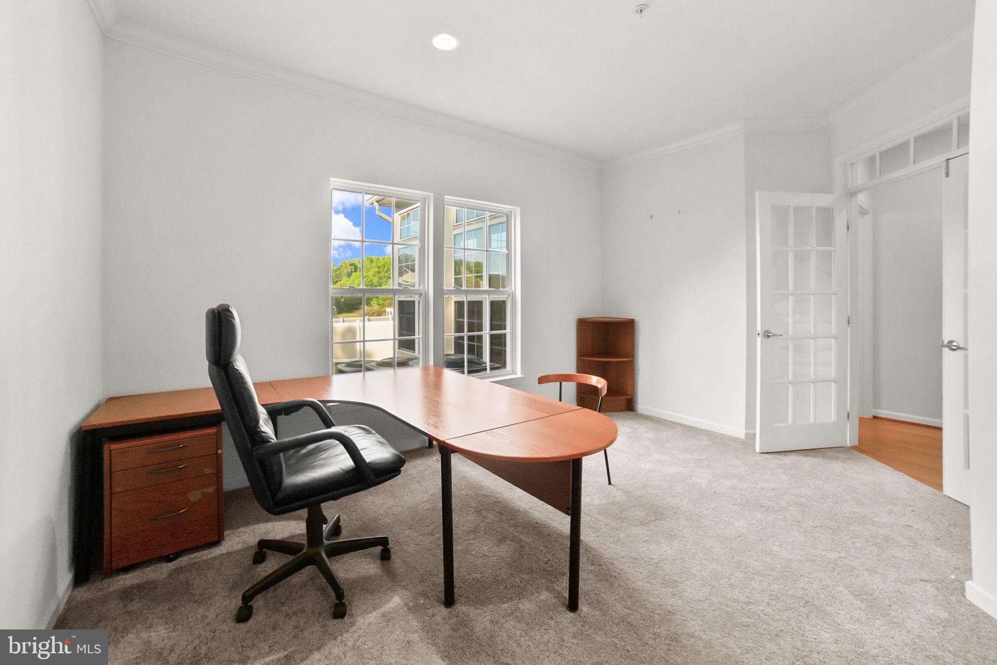 14909 Taryn Lea Court Accokeek, MD 20607 - Photo 13 of 49 a view of a workspace with furniture and a window