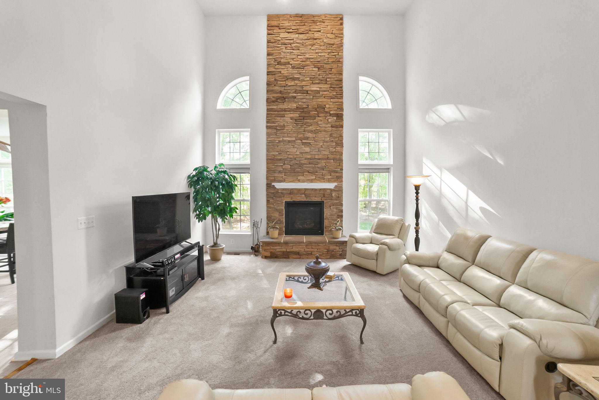 14909 Taryn Lea Court Accokeek, MD 20607 - Photo 14 of 49 a living room with furniture and a flat screen tv