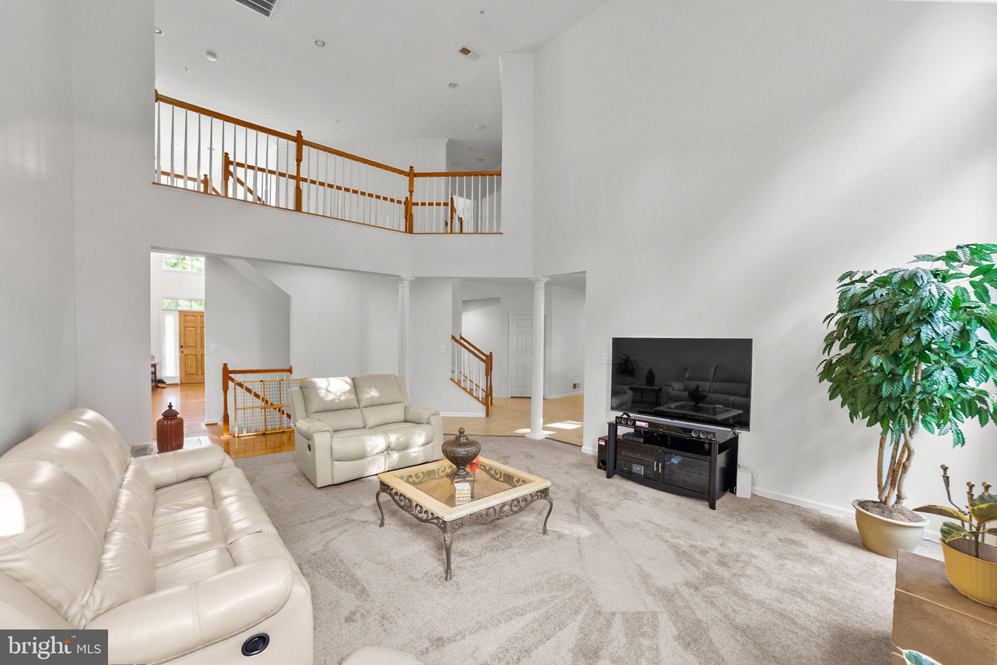 14909 Taryn Lea Court Accokeek, MD 20607 - Photo 15 of 49 a living room with furniture and a flat screen tv