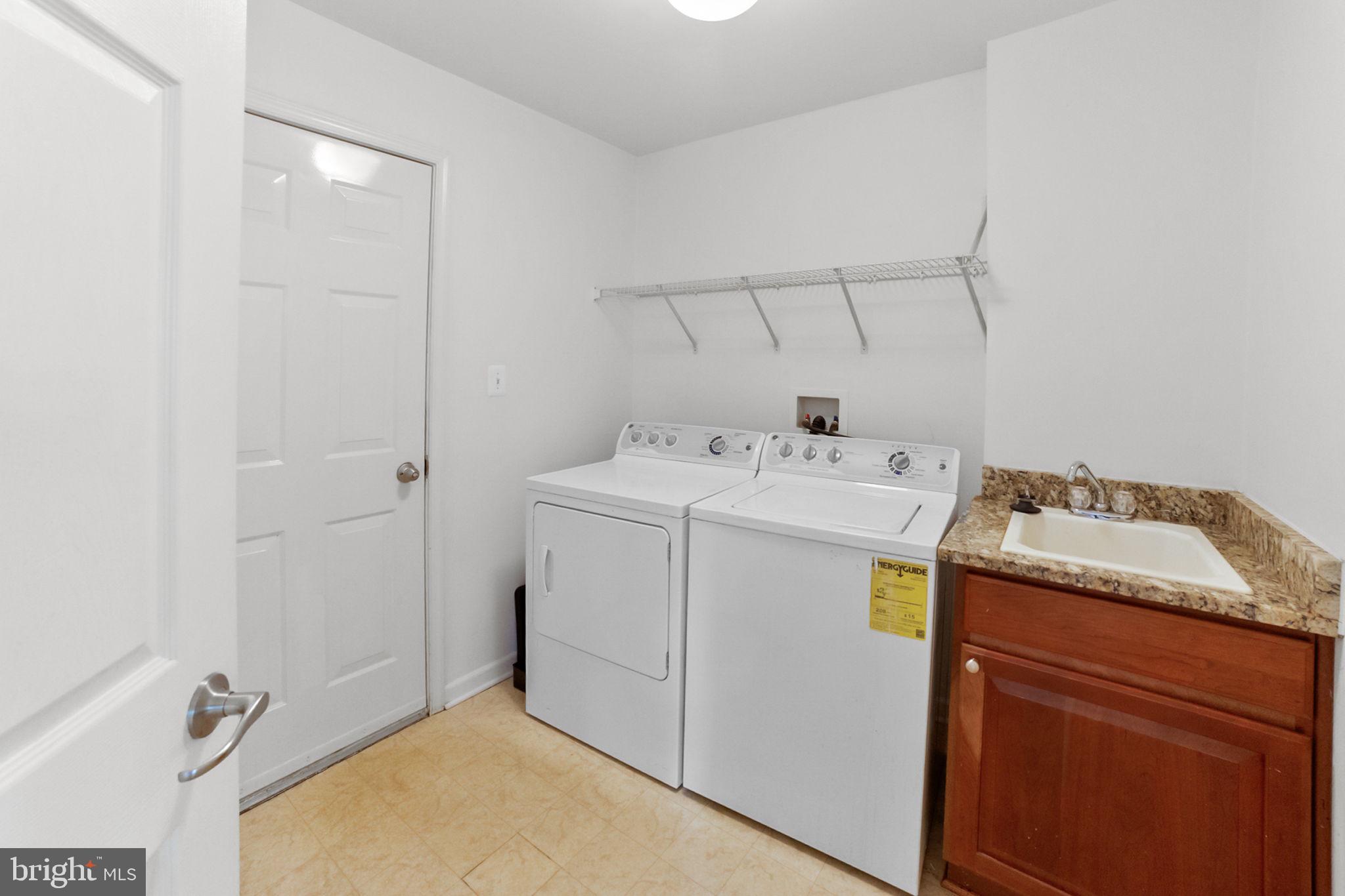 14909 Taryn Lea Court Accokeek, MD 20607 - Photo 24 of 49 a utility room with dryer and washer