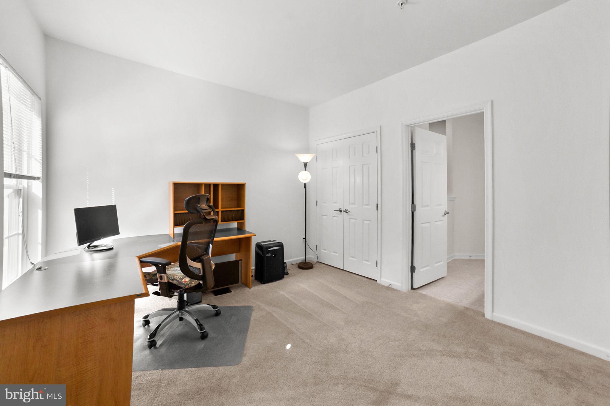 14909 Taryn Lea Court Accokeek, MD 20607 - Photo 25 of 49 a view of a workspace with furniture and a window