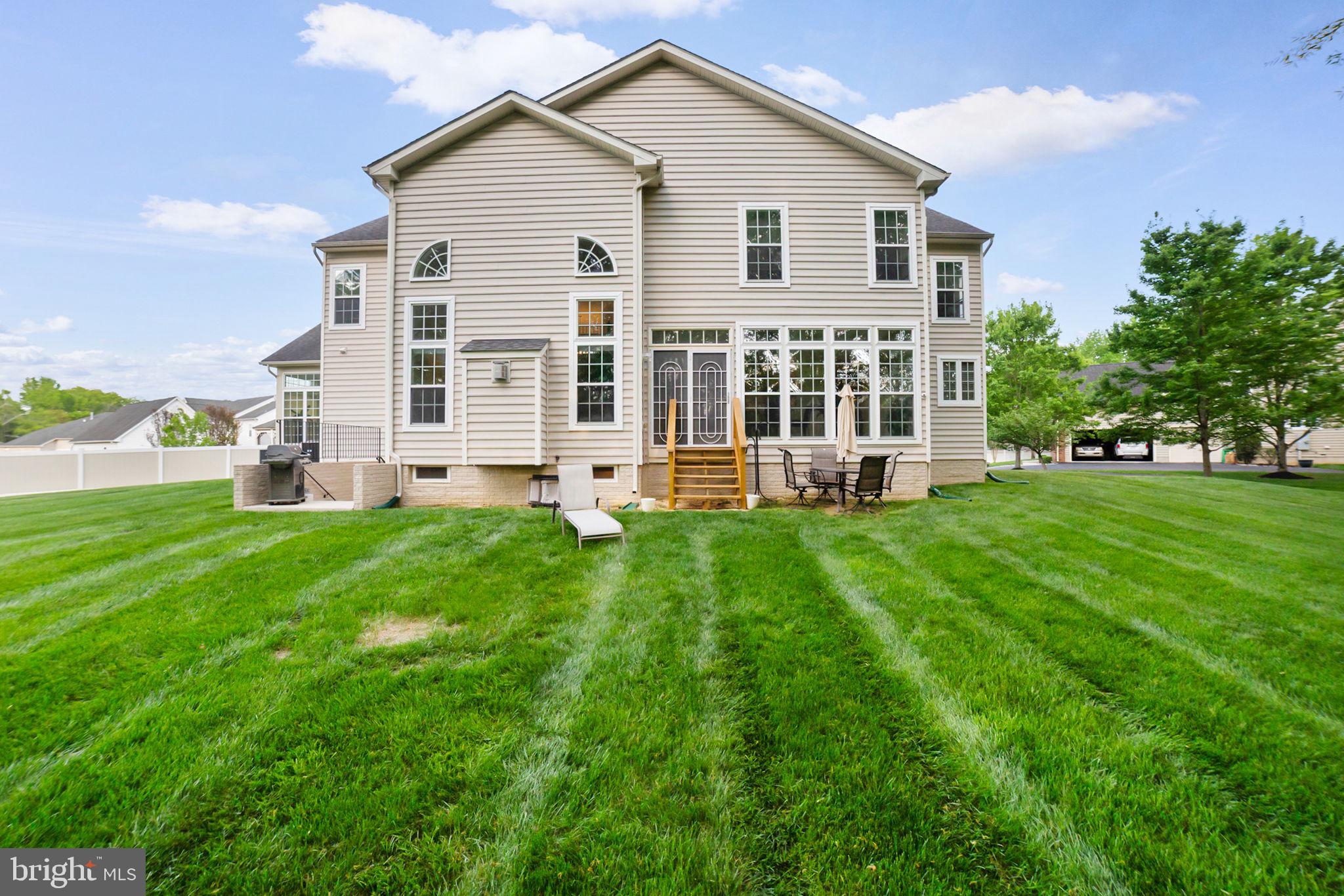14909 Taryn Lea Court Accokeek, MD 20607 - Photo 49 of 49 a view of a house with a yard and garden
