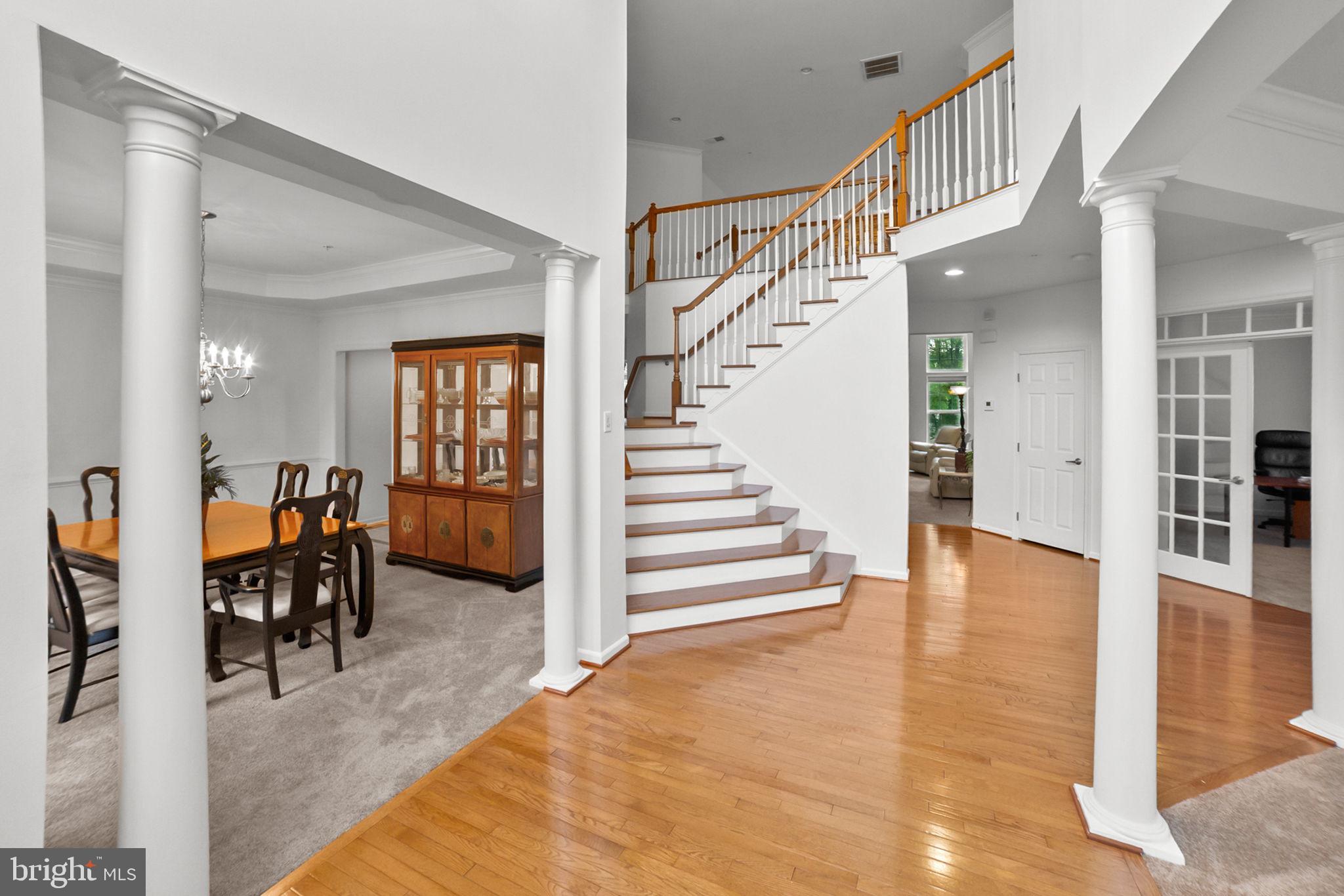 14909 Taryn Lea Court Accokeek, MD 20607 - Photo 8 of 49 a view of entryway and hall with dining room
