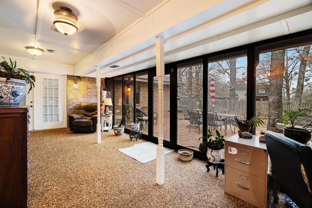 4145 Sleepy Hollow Reno, TX 75462 - Photo 9 of 20 a view of a livingroom with couch and a large window