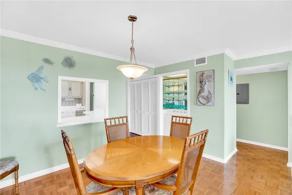 a view of a dining room with furniture