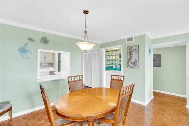 a view of a dining room with furniture