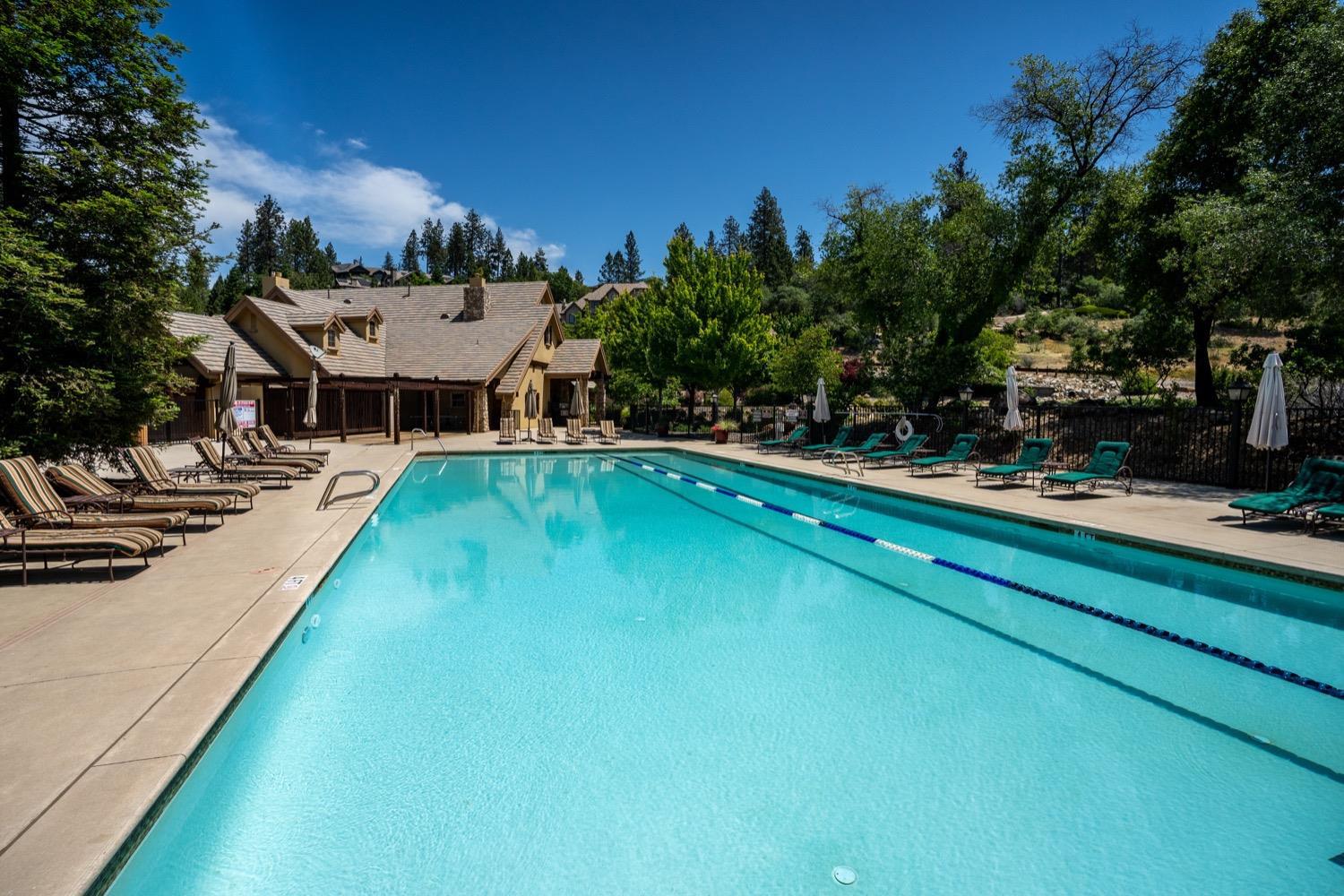 1575 Ridgemore Drive Meadow Vista, CA 95722 - Photo 14 of 30 a view of a swimming pool with lounge chair