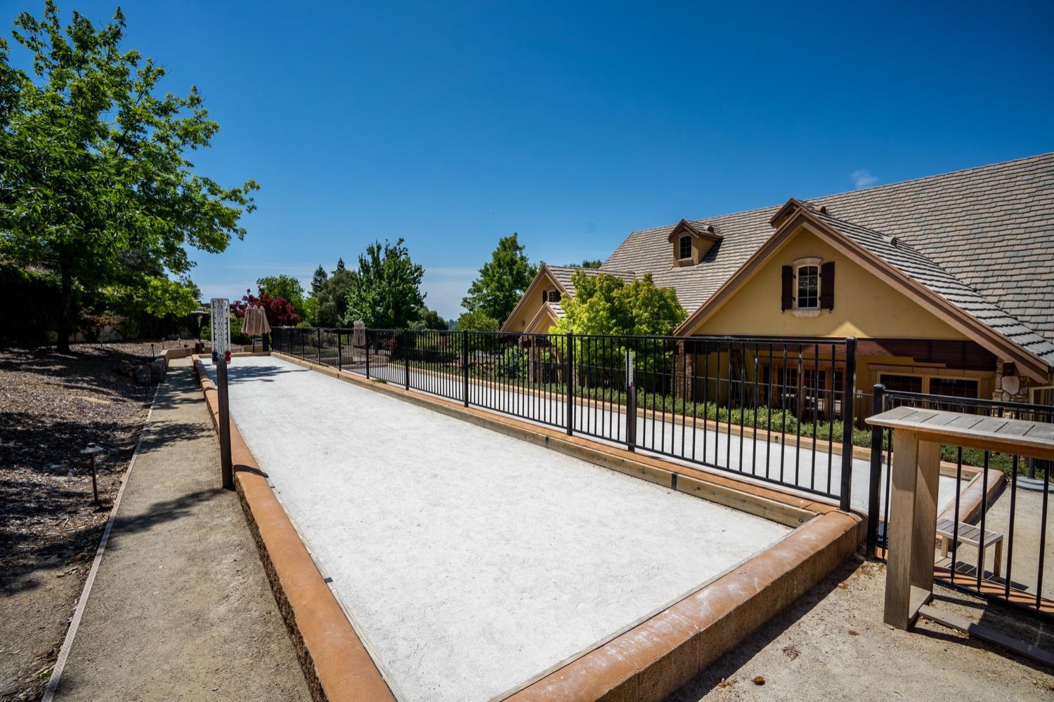 1575 Ridgemore Drive Meadow Vista, CA 95722 - Photo 25 of 30 a view of a house with wooden fence