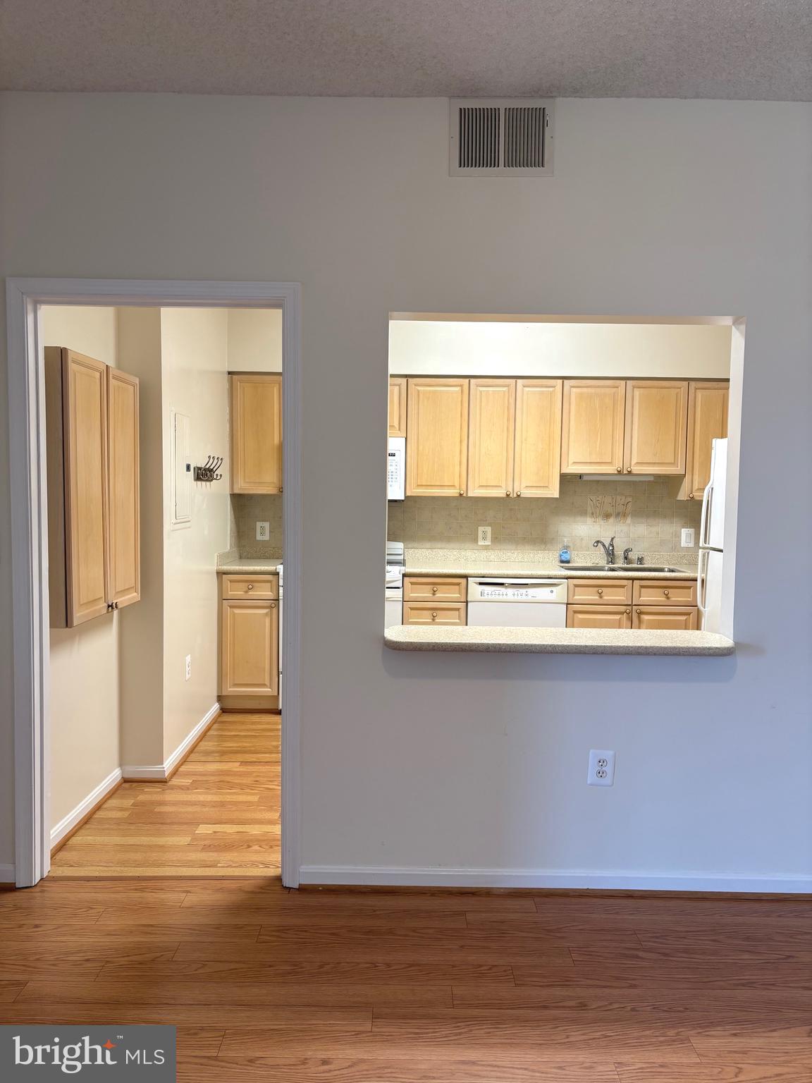 3200 North Leisure World Boulevard, Unit 911 Silver Spring, MD 20906 - Photo 19 of 39 a view of a living room with a large window