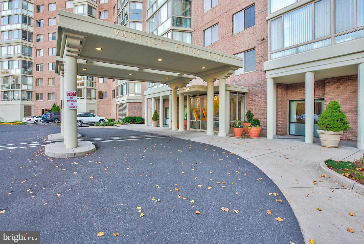 3200 North Leisure World Boulevard, Unit 911 Silver Spring, MD 20906 - Photo 2 of 39 a front view of a building with street view
