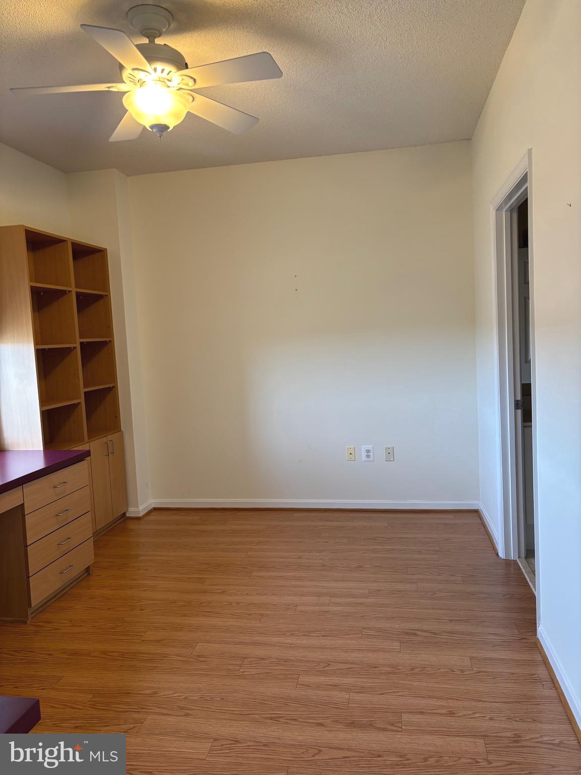 3200 North Leisure World Boulevard, Unit 911 Silver Spring, MD 20906 - Photo 21 of 39 a view of an empty room with a window
