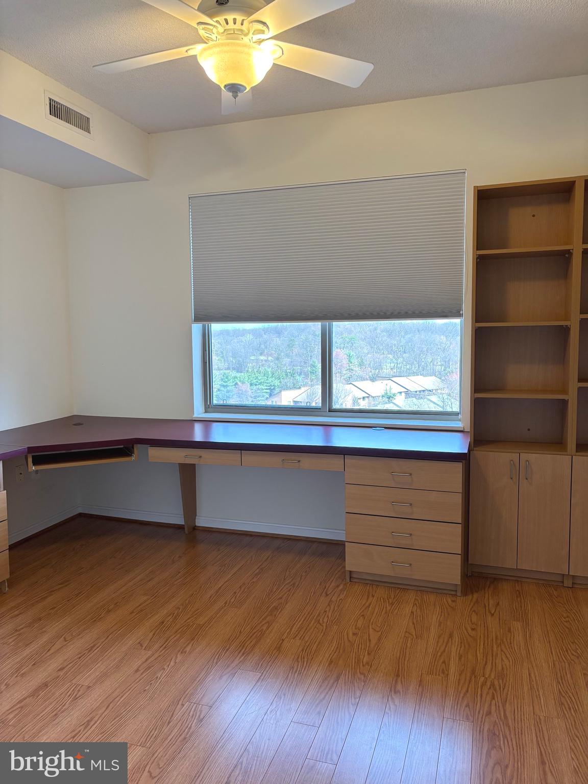 3200 North Leisure World Boulevard, Unit 911 Silver Spring, MD 20906 - Photo 22 of 39 a view of walk in closet with empty racks