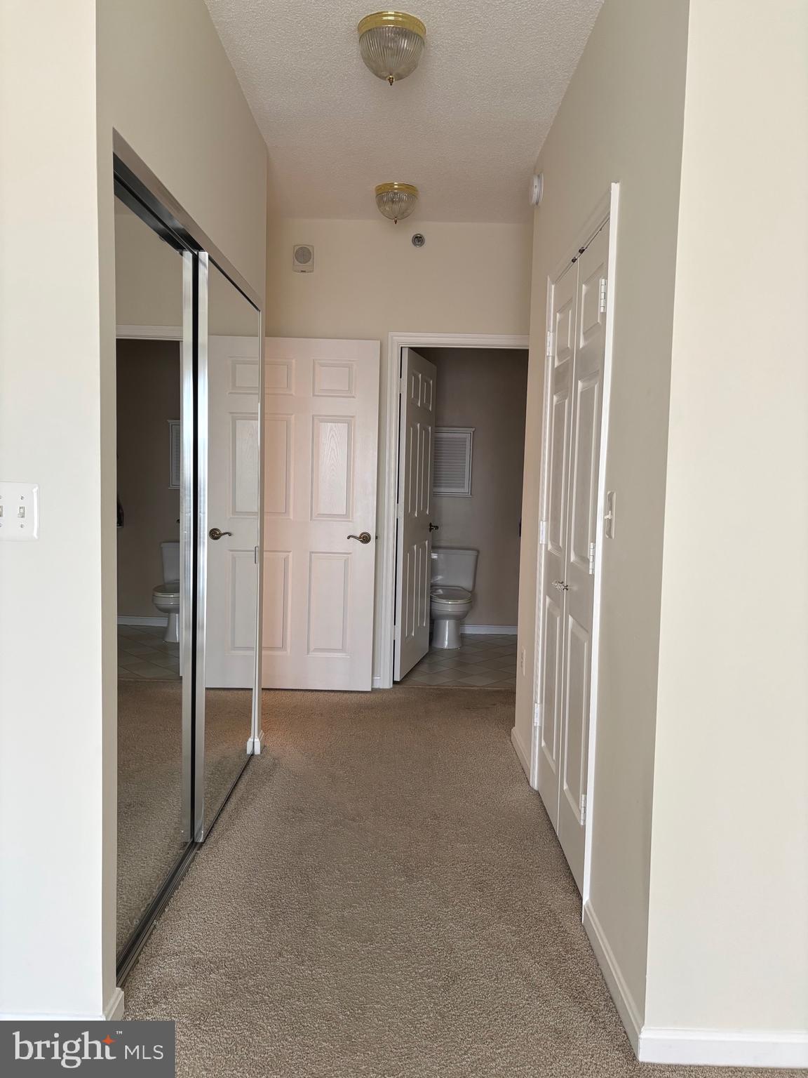 3200 North Leisure World Boulevard, Unit 911 Silver Spring, MD 20906 - Photo 25 of 39 an empty room with closet