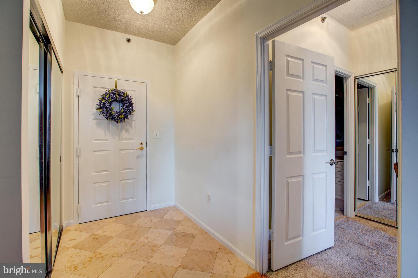 3200 North Leisure World Boulevard, Unit 911 Silver Spring, MD 20906 - Photo 3 of 39 a view of a hallway