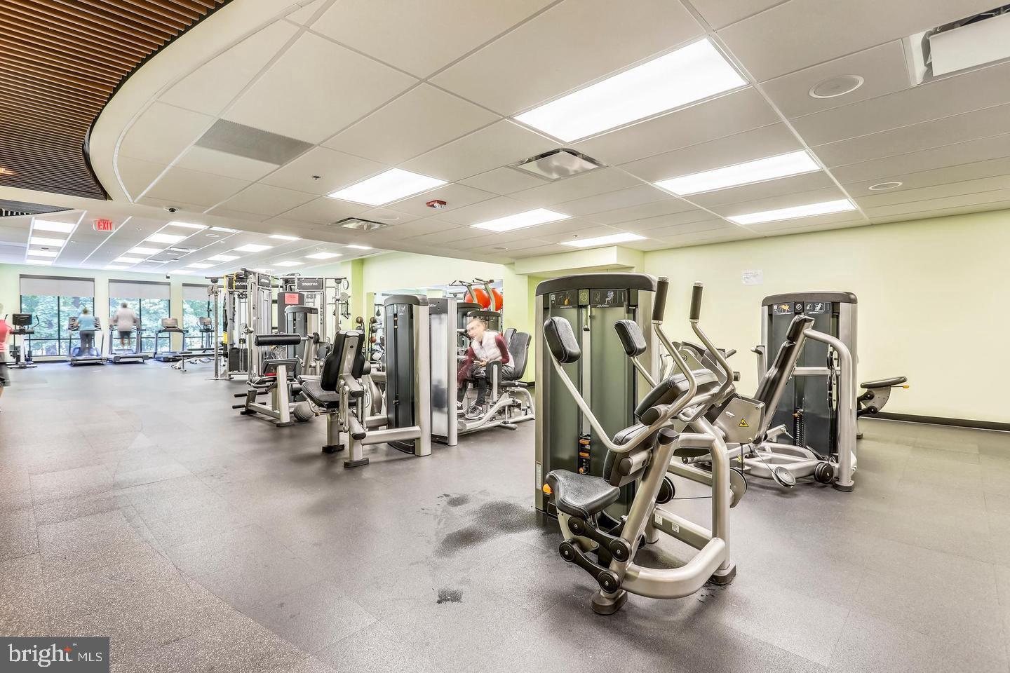 3200 North Leisure World Boulevard, Unit 911 Silver Spring, MD 20906 - Photo 36 of 39 a view of a room with gym equipment