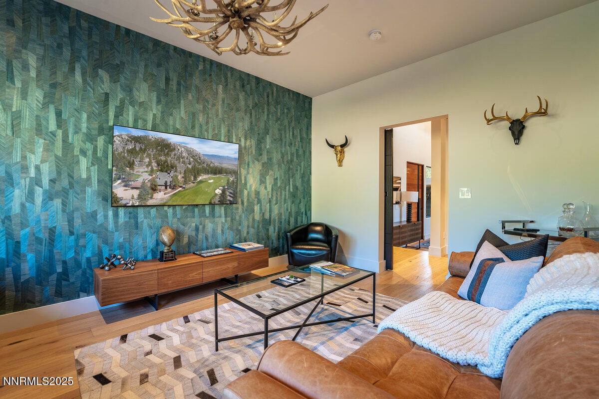 181 Redding Way Carson City, NV 89705 - Photo 30 of 40 a living room with furniture and a painting on the wall