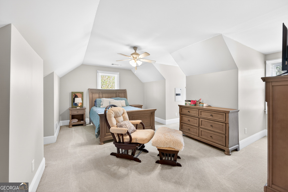 1121 Deer Trail Bishop, GA 30621 - Photo 39 of 98 a living room with furniture and a chandelier
