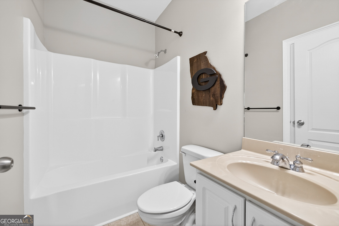 1121 Deer Trail Bishop, GA 30621 - Photo 51 of 98 a bathroom with a sink toilet and shower