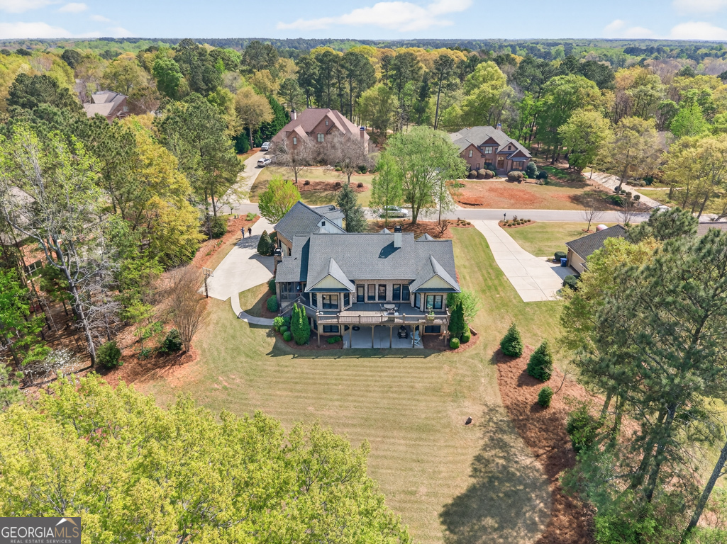1121 Deer Trail Bishop, GA 30621 - Photo 94 of 98 a view of a house with pool and a yard