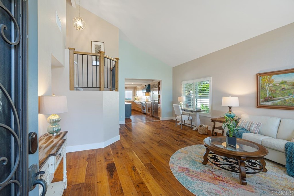 1784 Hawk View Drive Encinitas, CA 92024 - Photo 39 of 71 a living room with furniture and a wooden floor
